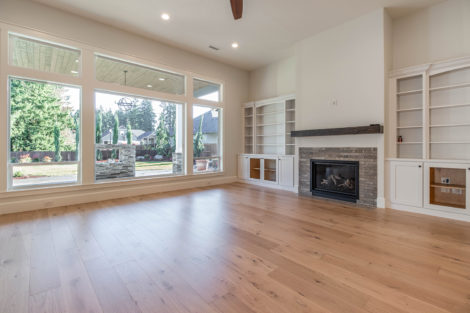 Heights at Pleasant Valley Lot 48 great room with built-in shelving and fireplace